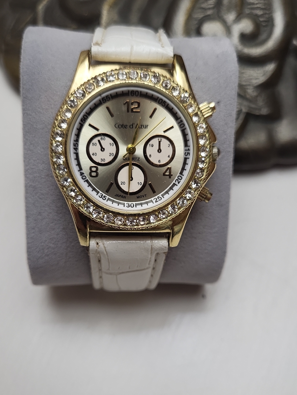 Gold-Tone Watch with White Leather Strap